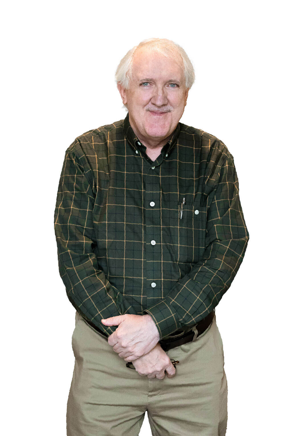 Elderly man in plaid shirt smiling warmly.